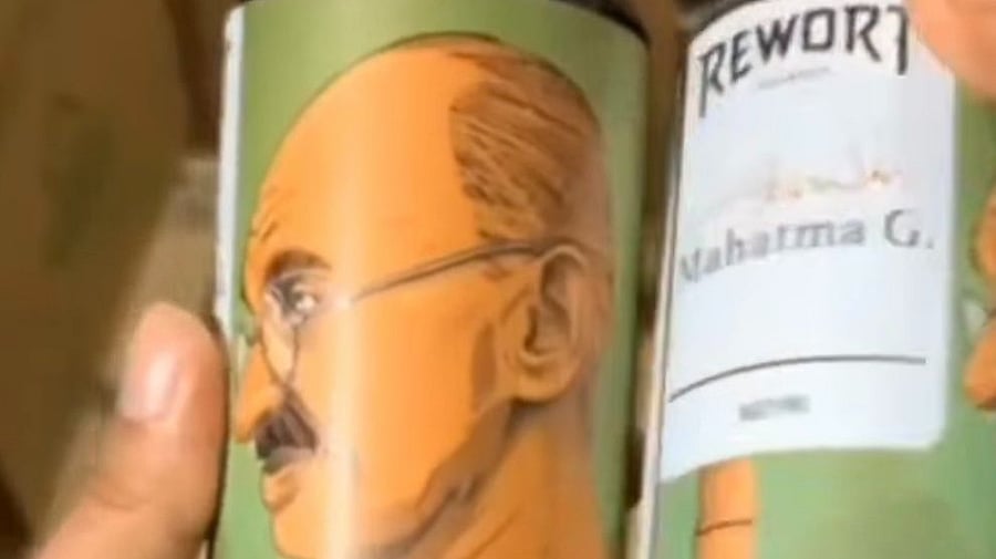 <div class="paragraphs"><p>Picture of Mahatma Gandhi on a Rewort beer can.</p></div>