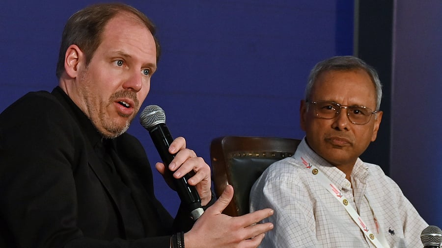 Dominik Heinrich, Global Head of AI Design at The Coca-Cola Company, with Manish Gupta, Senior Director, Google DeepMind, at the GIM in Bengaluru. DH PHOTO/PUSHKAR V