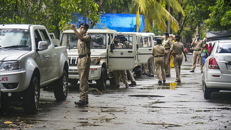 <div class="paragraphs"><p>A team of NIA arrives to conduct a raid at former 'encounter specialist' police officer Pradeep Sharma’s residence at Andheri, in connection with the 'Antilia’ bomb scare case and businessman Mansukh Hiren’s murder case. </p></div>