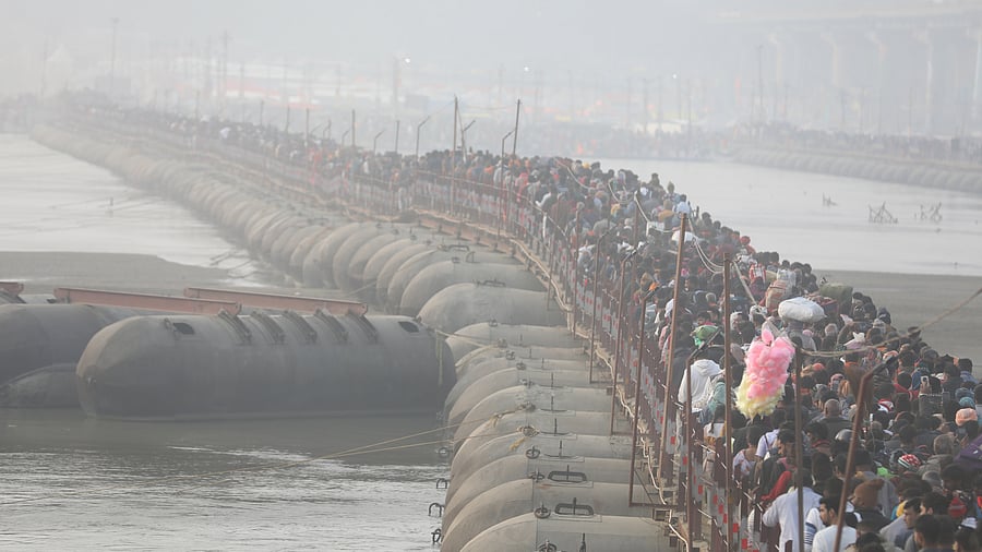 <div class="paragraphs"><p>Devotees walking on a pontoon bridge from the Sangam, at the MahaKumbh 2025, at Prayagraj, Uttar Pradesh, January 13.</p></div>