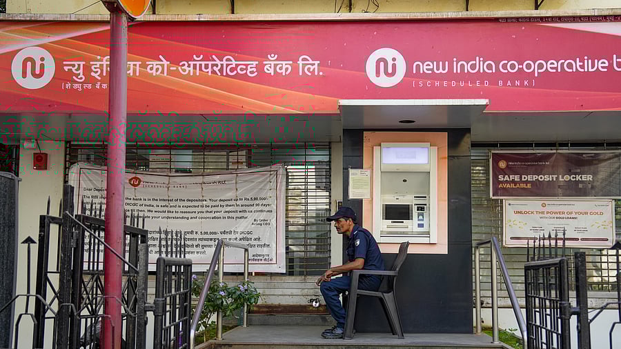 <div class="paragraphs"><p>A security personnel keeps vigil at a deserted New India Cooperative Bank, in Mumbai, Saturday, Feb. 15, 2025.</p></div>