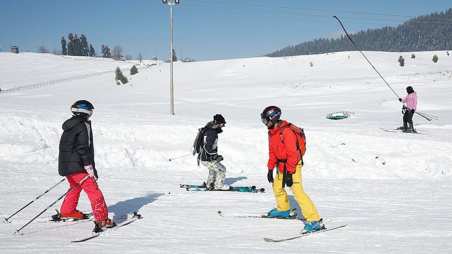 <div class="paragraphs"><p>Skiers ski after a training session in a snow-covered field in Gulmarg, a ski resort and one of the main tourist attractions in the Kashmir region, January 7, 2025. </p></div>