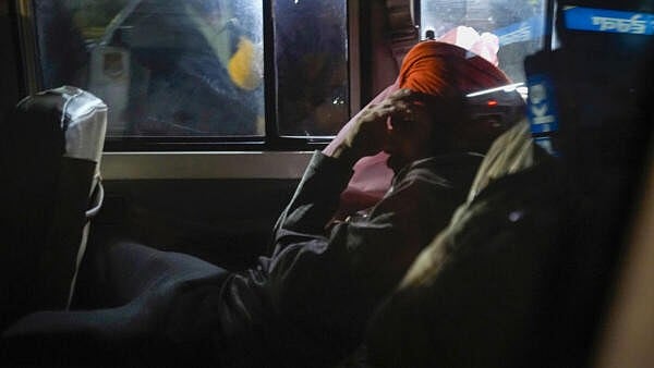 <div class="paragraphs"><p>An Indian deported from the US leave the airport upon their arrival, in Amritsar.</p></div>