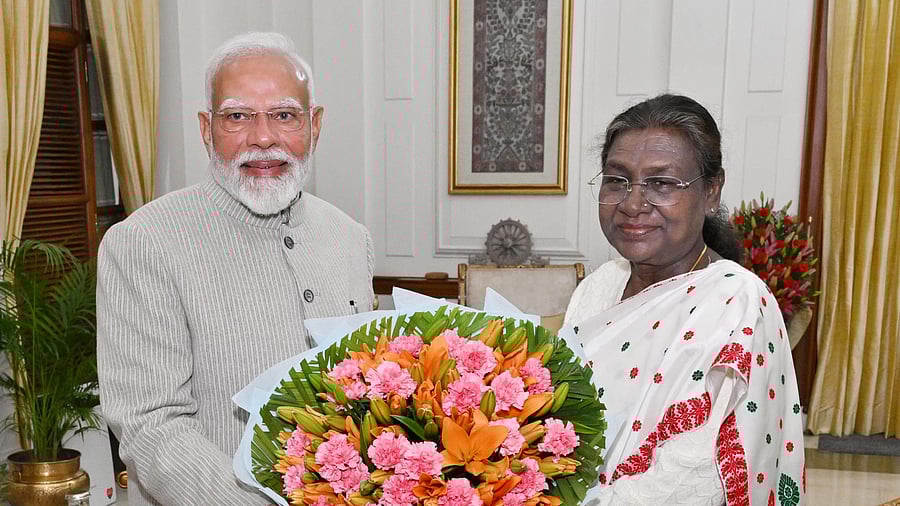 <div class="paragraphs"><p>PM Modi with Murmu.&nbsp;</p></div>