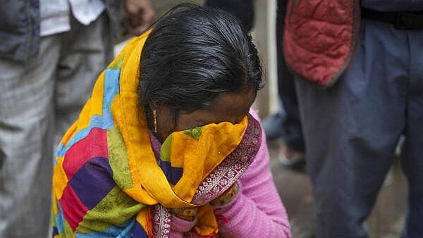 <div class="paragraphs"><p>A relative of a stampede victim mourns outside the mortuary at the LNJP Hospital, in New Delhi, Sunday, Feb. 16, 2025. At least 18 people were killed and more than a dozen injured in a stampede that broke out late Saturday night at the crowded New Delhi railway station.</p></div>
