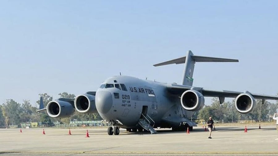 <div class="paragraphs"><p>A US military aircraft carrying illegal Indian immigrants upon its landing at the Shri Guru Ramdas Ji International Airport, in Amritsar</p></div>