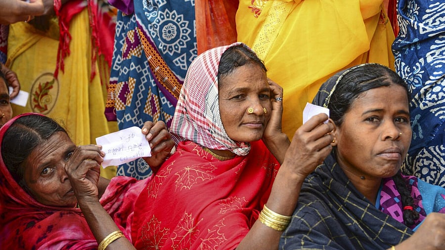 <div class="paragraphs"><p>Women wait to cast their votes for the Chhattisgarh local bodies elections, on the outskirts of Jagdalpur in Bastar district, Monday. </p></div>