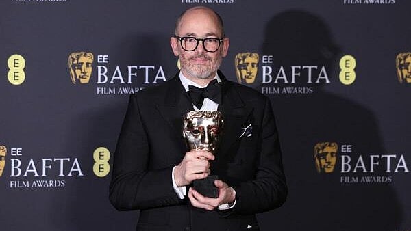 <div class="paragraphs"><p>Director Edward Berger poses with the award for the Outstanding British Film Award for "Conclave", during the 2025 British Academy of Film and Television Awards (BAFTA) at the Royal Festival Hall in the Southbank Centre, London, Britain, February 16, 2025.</p></div>
