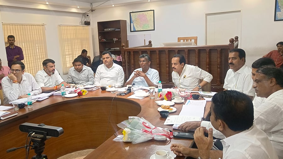 <div class="paragraphs"><p>PWD Minister Satish Jarkiholi&nbsp;at the DC’s office in Mangaluru</p></div>