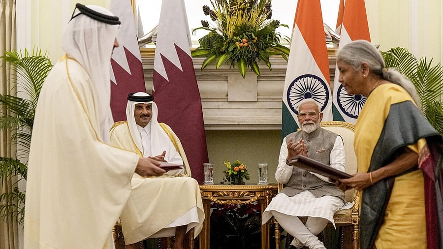 <div class="paragraphs"><p>Prime Minister Narendra Modi and Amir of Qatar Sheikh Tamim bin Hamad Al Thani witness Union Finance Minister Nirmala Sitharaman and Prime Minister and Minister of Foreign Affairs of Qatar Sheikh Mohammed bin Abdulrahman bin Jassim Al Thani exchanging MoU documents, at the Hyderabad House in New Delhi, Tuesday, Feb. 18, 2025. </p></div>
