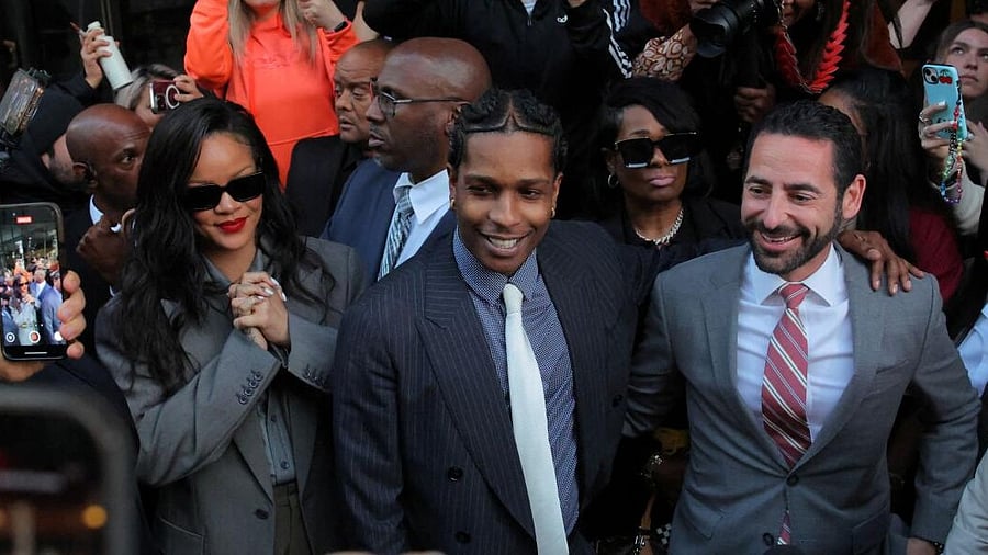 <div class="paragraphs"><p>Rakim Mayers, aka A$AP Rocky, reacts as he exits the court, next to Rihanna, after the verdict is given in his felony assault trial at the Clara Shortridge Foltz Criminal Justice Center in Los Angeles, California, US.</p></div>