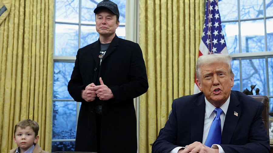 <div class="paragraphs"><p> US President Donald Trump speaks next to Elon Musk </p></div>