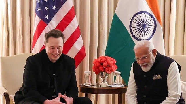 <div class="paragraphs"><p>Narendra Modi with Tesla CEO Elon Musk</p></div>