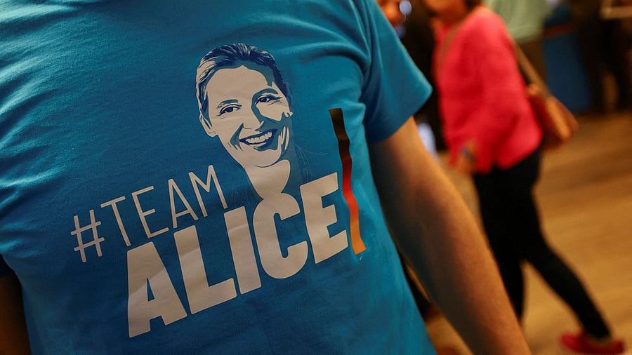 <div class="paragraphs"><p>An attendee wears a T-shirt supporting Alternative for Germany party  co-leader Alice Weidel at an AfD election campaign </p></div>