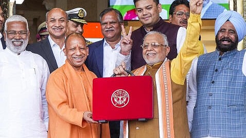 <div class="paragraphs"><p>Uttar Pradesh Chief Minister Yogi Adityanath with state Finance Minister Suresh Kumar Khanna before the presentation of the State Budget 2025-26 in the Assembly, in Lucknow</p></div>