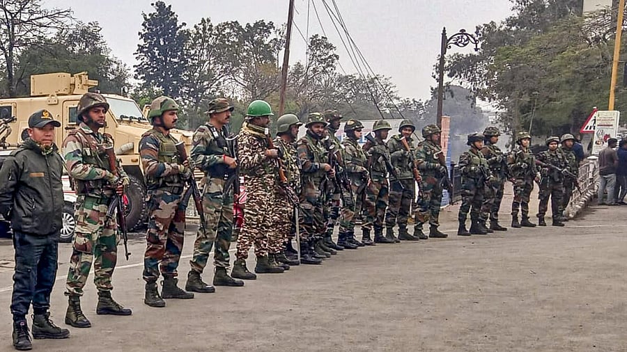 <div class="paragraphs"><p>Security personnel stand guard in Imphal following imposition of President's rule.</p></div>
