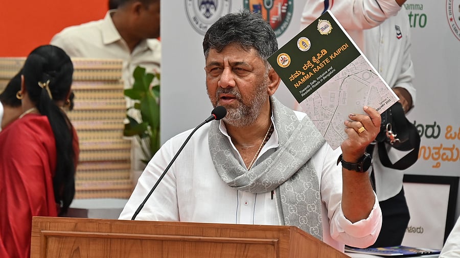 <div class="paragraphs"><p>Deputy Chief Minister DK Shivakumar releases the ‘Namma Raste Kaipidi’ on Thursday. </p></div>