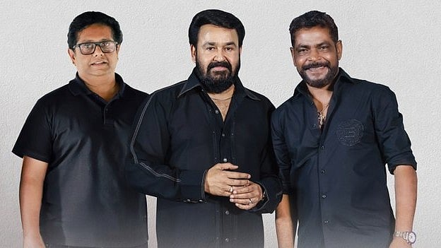 <div class="paragraphs"><p>Mohanlal with producer of 'Drishyam' Antony Perumbavoor and director&nbsp;Jeethu Joseph.</p></div>