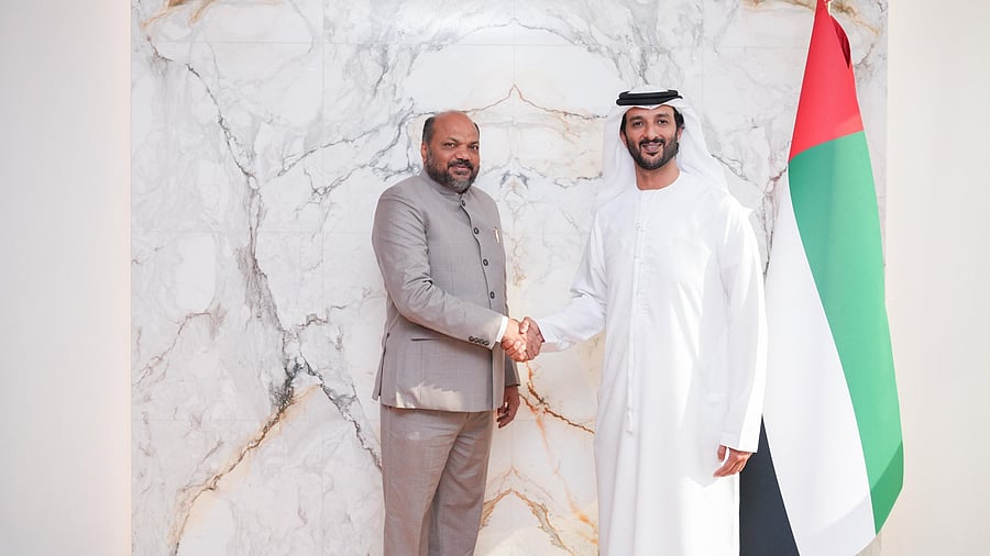 <div class="paragraphs"><p>Abdulla bin Touq Al Marri, UAE Minister of Economy with P Rajeev</p></div>