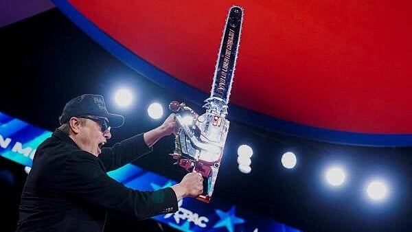 <div class="paragraphs"><p>Elon Musk holds up a chainsaw onstage during the Conservative Political Action Conference (CPAC) in National Harbor, Maryland, US.</p></div>