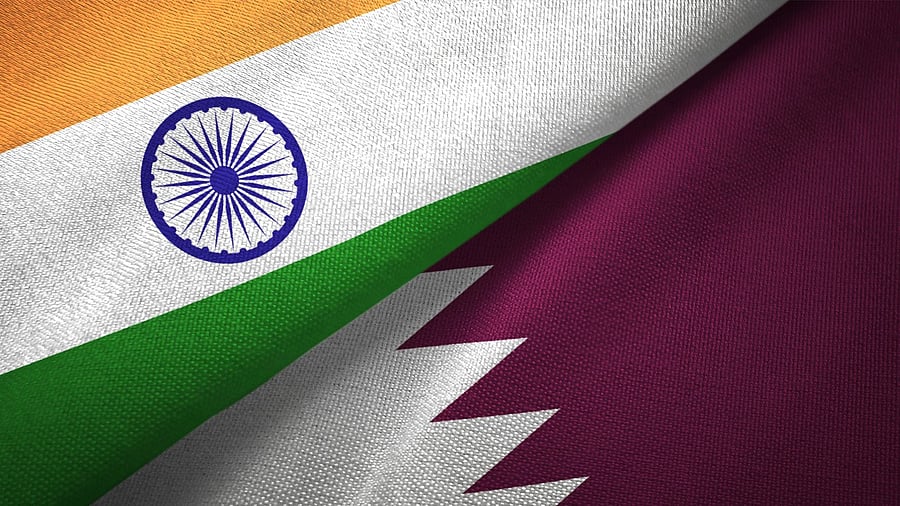 <div class="paragraphs"><p>Indian and Qatari flags.</p></div>