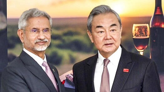 <div class="paragraphs"><p>External Affairs Minister S Jaishankar with China's Foreign Minister Wang Yi during a meeting on the sidelines of the G20 Foreign Ministers meeting, in Johannesburg.</p></div>