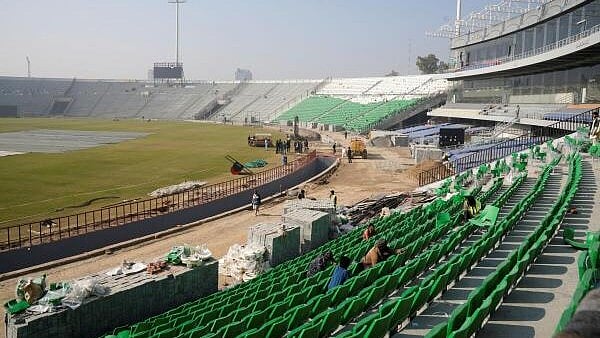 <div class="paragraphs"><p>Labourers work during a media tour, organized by the Pakistan Cricket Board (PCB), to showcase the progress of the renovation work ahead of the ICC Champions Trophy 2025 tournament at the Gaddafi Stadium in Lahore, Pakistan January 20, 2025.</p></div>