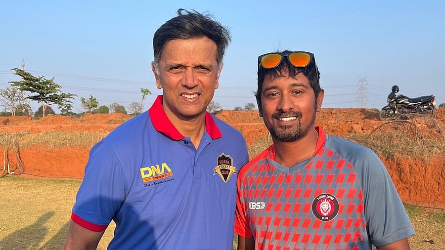 <div class="paragraphs"><p>Rahul Dravid (left) poses with Young Lions Club's all-rounder AR Ullas who dismissed the former India captain in a KSCA league in Bengaluru on Saturday. </p></div>