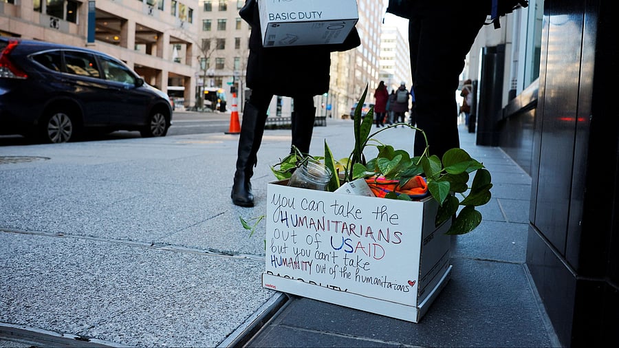 <div class="paragraphs"><p>Recently fired U.S. Agency for International Development  staff leave work during a sendoff by former USAID staffers and supporters, outside USAID offices in Washington, D.C., U.S., February 21, 2025.   </p></div>