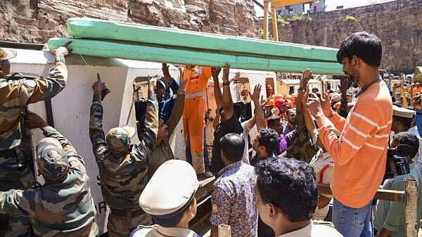 <div class="paragraphs"><p>Rescue operations underway after a section of the Srisailam Left Bank Canal (SLBC) project collapsed, in Nagarkurnool district, Sunday, Feb. 23, 2025. Eight workers are feared trapped.</p></div>