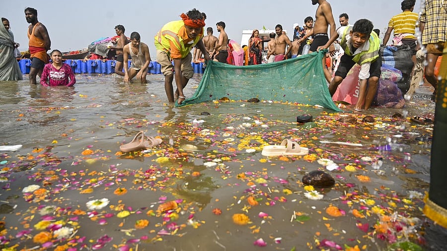 <div class="paragraphs"><p>Puja material and other waste being collected at the Sangam for their disposal, during the ongoing Maha Kumbh Mela 2025, in Prayagraj, Uttar Pradesh, Friday, Feb. 21, 2025.</p></div>