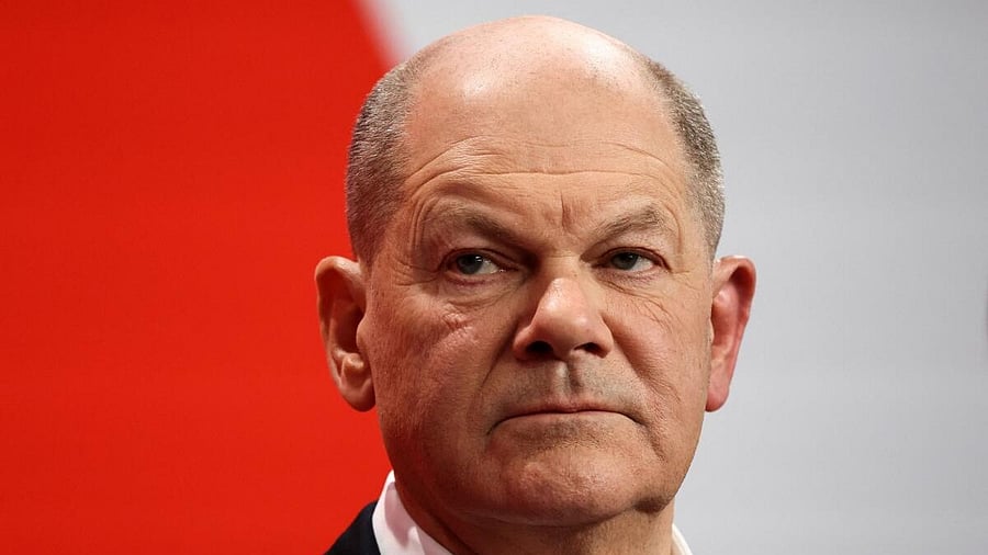<div class="paragraphs"><p>German Chancellor Olaf Scholz of the Social Democratic Party (SPD) reacts after the exit poll results are announced for the 2025 general election in Berlin, Germany, February 23, 2025.</p></div>