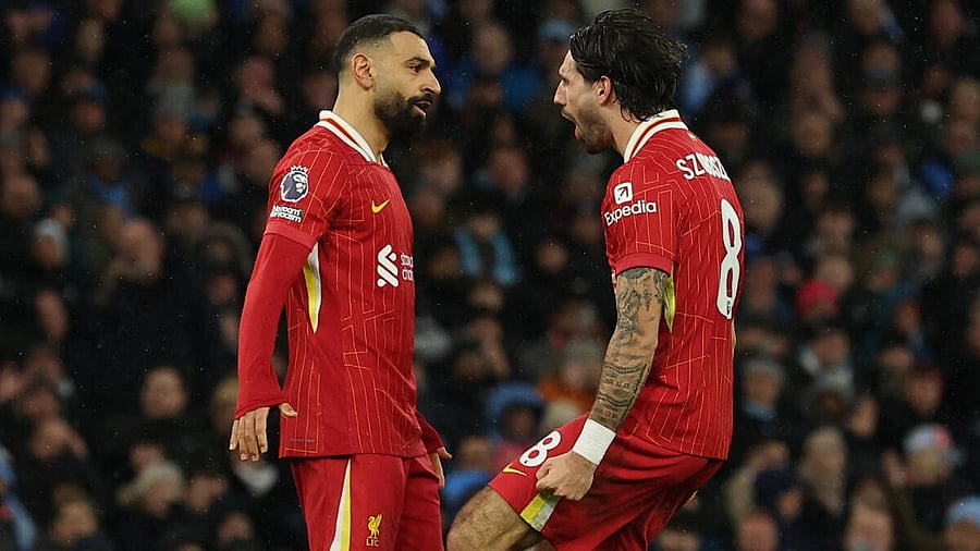 <div class="paragraphs"><p>Liverpool's Dominik Szoboszlai celebrates scoring their second goal with Mohamed Salah </p></div>