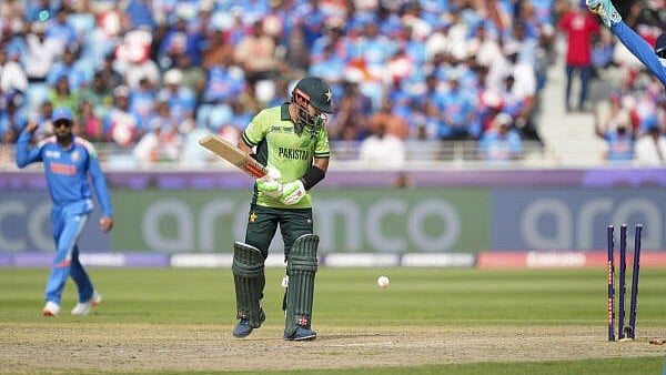 <div class="paragraphs"><p>Pakistan's captain Mohammad Rizwan reacts after being bowled by India's Axar Patel</p></div>