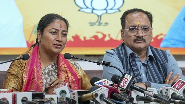 <div class="paragraphs"><p>Delhi Chief Minister Rekha Gupta and Delhi BJP President Virendra Sachdeva address a press conference, in New Delhi.</p></div>