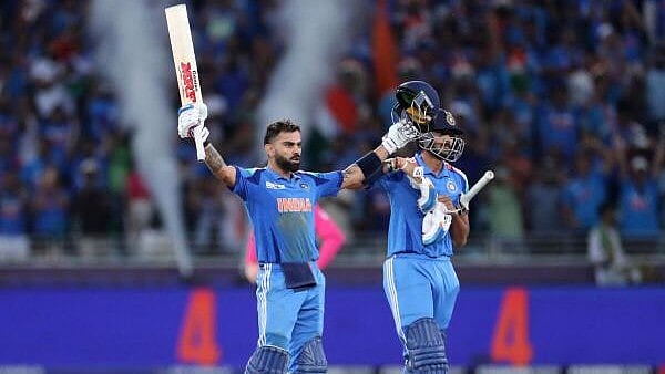 <div class="paragraphs"><p>Virat Kohli celebrates after hitting four runs to reach his century and win the match</p></div>