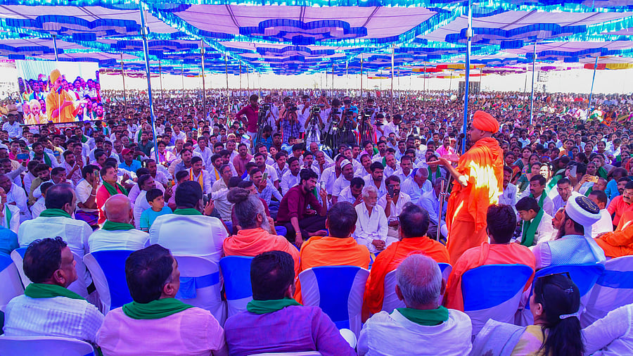 <div class="paragraphs"><p>The Gavimath seer addresses a public meeting organised as part of Koppal bandh on Monday. </p></div>