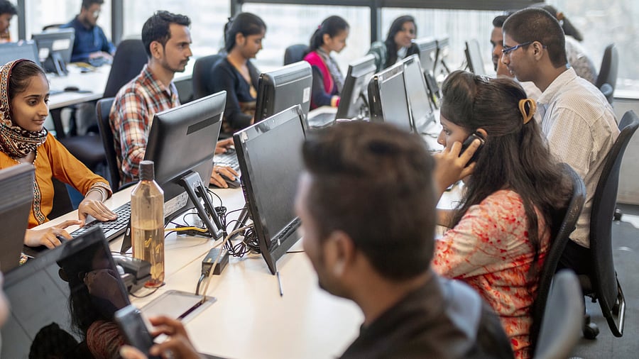 <div class="paragraphs"><p>Male and female professionals using computers at workplace. </p></div>