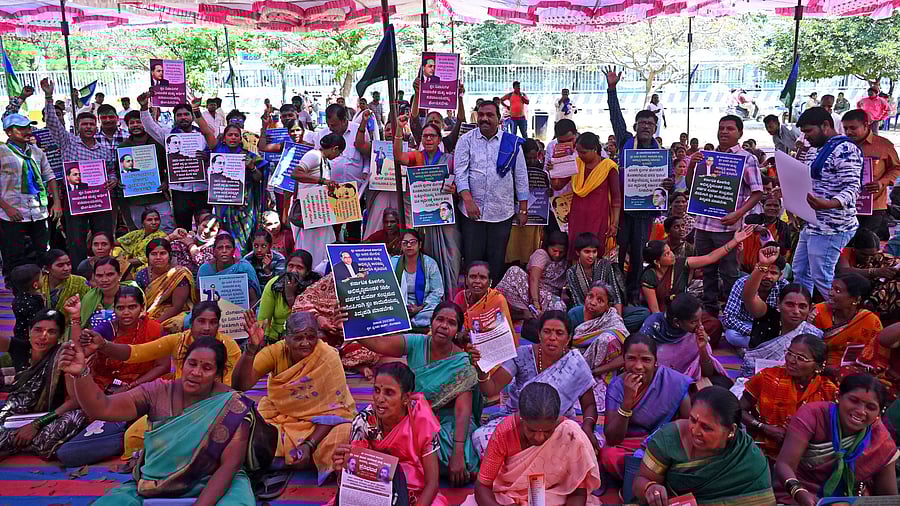 <div class="paragraphs"><p>Slum dwellers stage a protest at Freedom Park on Monday.</p></div>