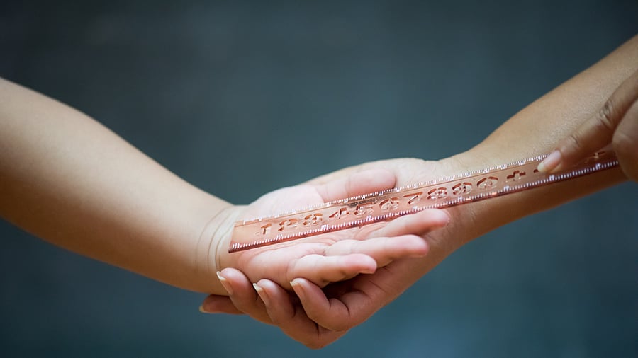 <div class="paragraphs"><p>Representative image of a student getting beaten with a ruler </p></div>
