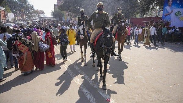 <div class="paragraphs"><p>Horse-mounted police personnel patrol during the ongoing Maha Kumbh Mela 2025, ahead of Maha Shivaratri festival, in Prayagraj, on Tuesday.</p></div>