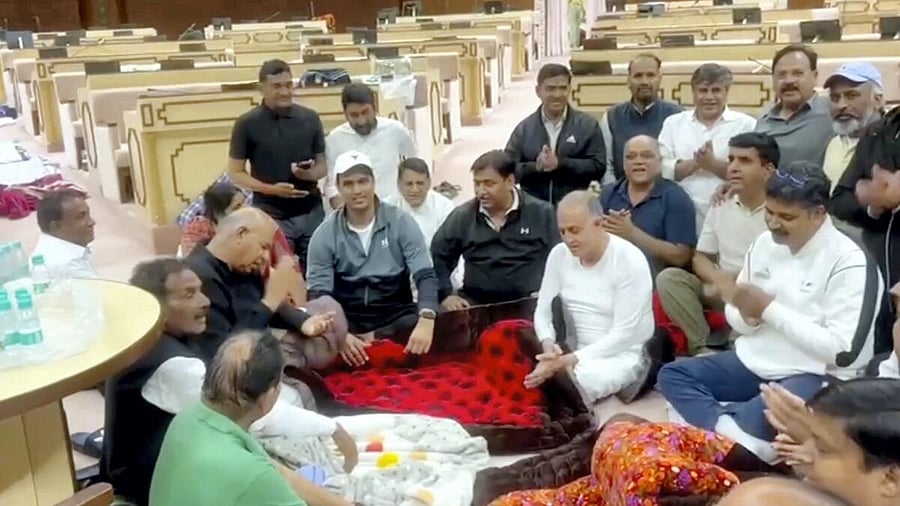 <div class="paragraphs"><p> Congress MLAs stage a protest against the suspension of six legiuslators in the Assembly at night, in Jaipur, Friday, Feb. 21, 2025.</p></div>