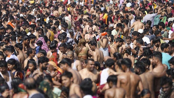 <div class="paragraphs"><p>Devotees gather to take a holy dip at Sangam during ongoing Maha Kumbh Mela</p></div>