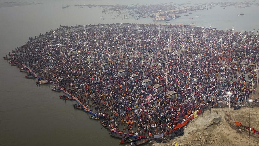 <div class="paragraphs"><p>Devotees gather to take a holy dip at Sangam on the occasion of Maha Shivratri during the Maha Kumbh Mela 2025, in Prayagraj, Wednesday, Feb. 26, 2025.</p></div>