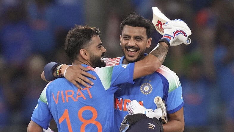 <div class="paragraphs"><p>India's Virat Kohli, left, and Axar Patel celebrate after winning the One Day International (ODI) cricket match of the ICC Champions Trophy between India and Pakistan, at Dubai International Cricket Stadium, in Dubai, UAE, Sunday, Feb. 23, 2025.</p></div>