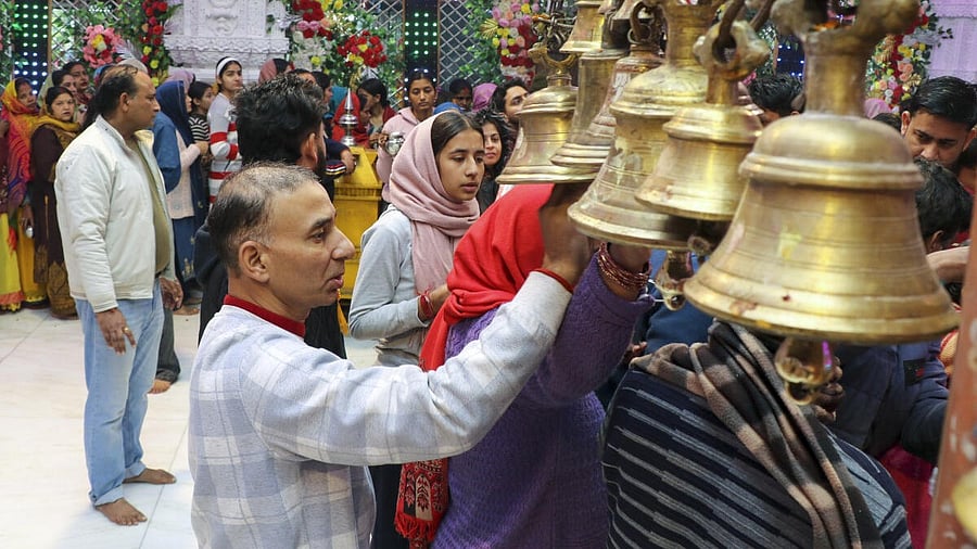 <div class="paragraphs"><p>Devotees offer prayers at Aap Shambhu temple on the occasion of MahaShivratri festival, in Jammu , Wednesday, Feb. 26, 2025.</p></div>