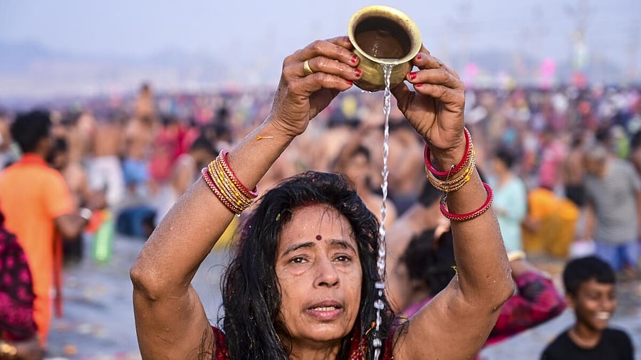 <div class="paragraphs"><p>A devotee performs rituals as she takes a holy dip at Sangam on the occasion of Maha Shivratri during the Maha Kumbh Mela 2025, in Prayagraj</p></div>