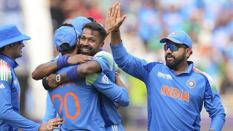 <div class="paragraphs"><p>Rohit Sharma with his teammates.</p></div>
