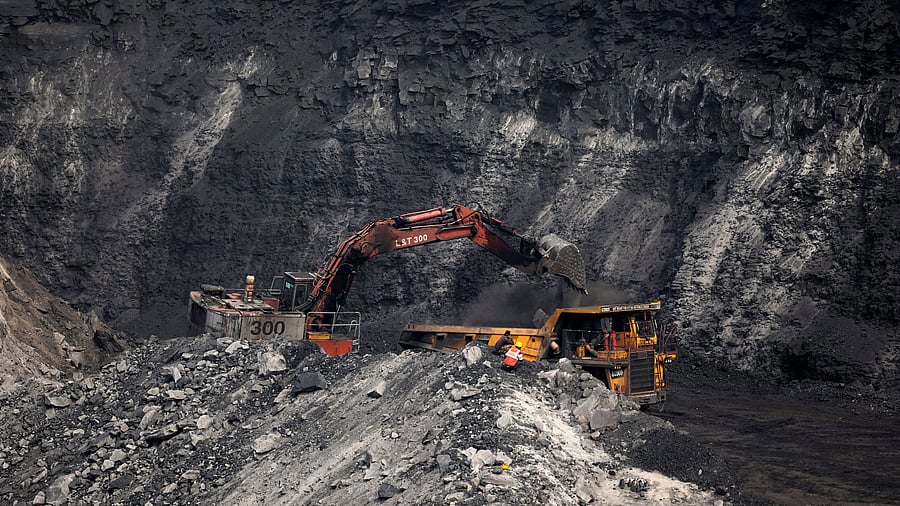 <div class="paragraphs"><p>A loader loads coal in the truck at an open cast coal field at Topa coal mine in the Ramgarh district in the eastern Indian state of Jharkhand </p></div>