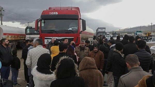 <div class="paragraphs"><p>Kurdish protesters block the road in front of trucks carrying oil in the Arbat area near Sulaymaniyah, Iraq February 23, 2025.</p></div>